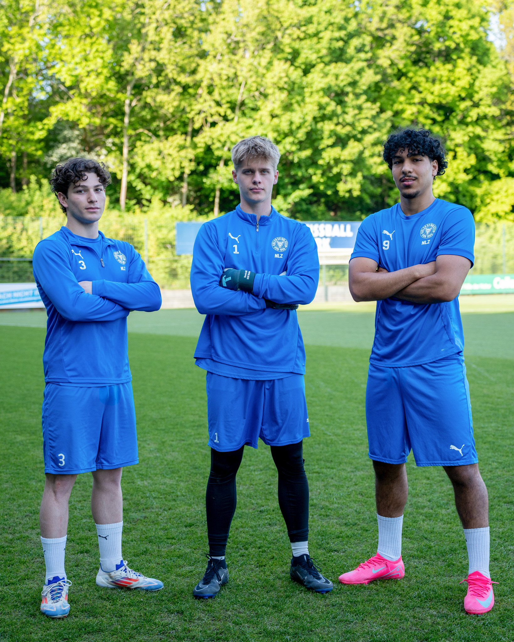 Drei Fussballspieler